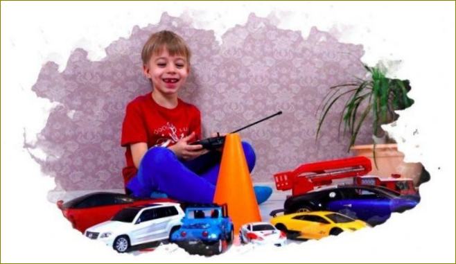 dječak se igra radio upravljanim automobilima
